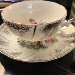 Vintage 3 footed tea cup made in Japan roses with silver guild. Rare!